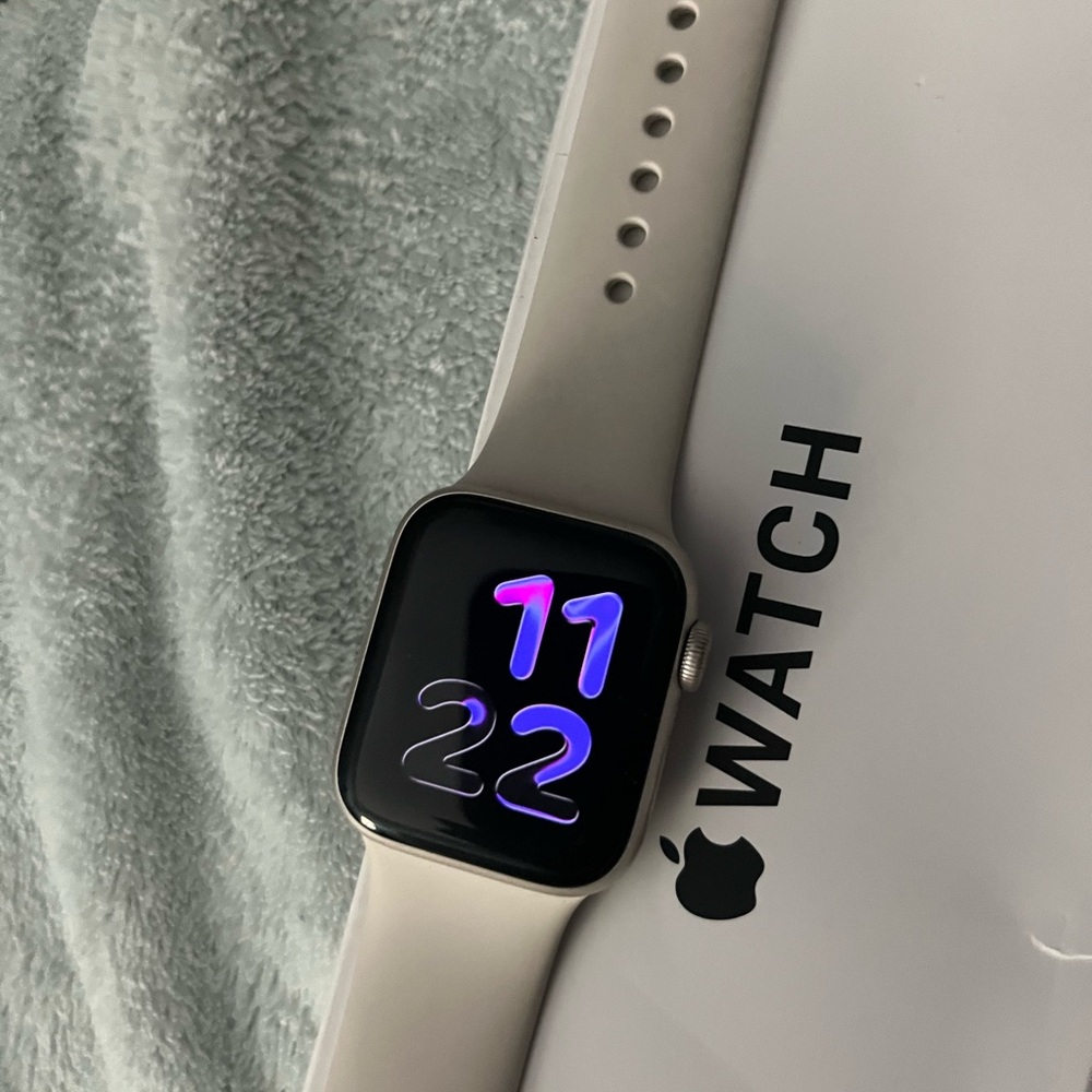 Apple Smartwatch with Silver Case and White Band
